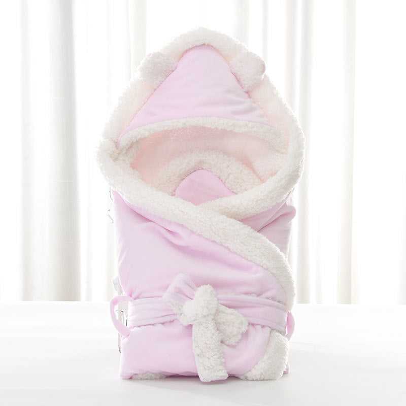 swaddled by baby